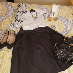 Black flared knee length skirt